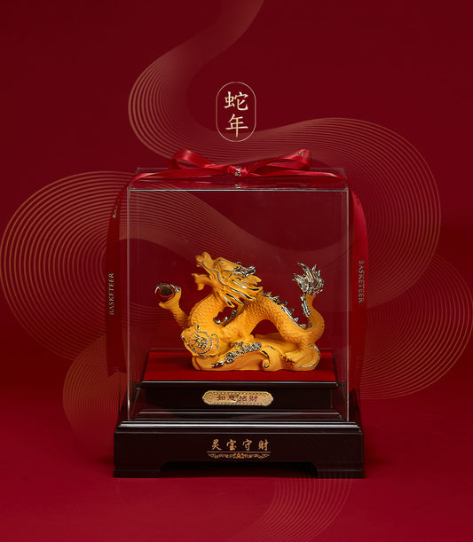 Gold dragon figurine in acrylic case with wooden base, red ribbon, Chinese New Year luxury gift