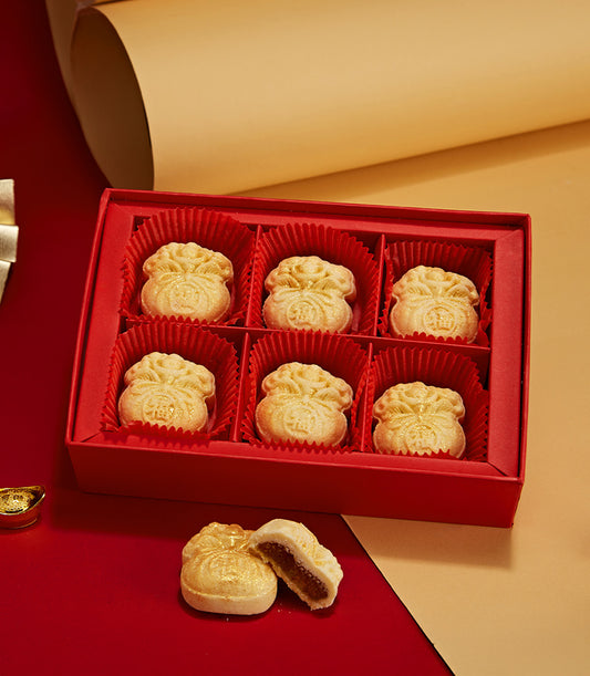 Red gift box with six golden cheese tarts shaped like money bags, embossed with Chinese character, perfect for Lunar New