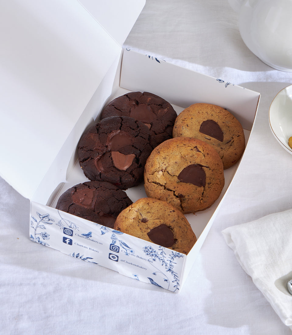 Assorted chocolate chip and double chocolate cookies in luxury white gift box with melted centers