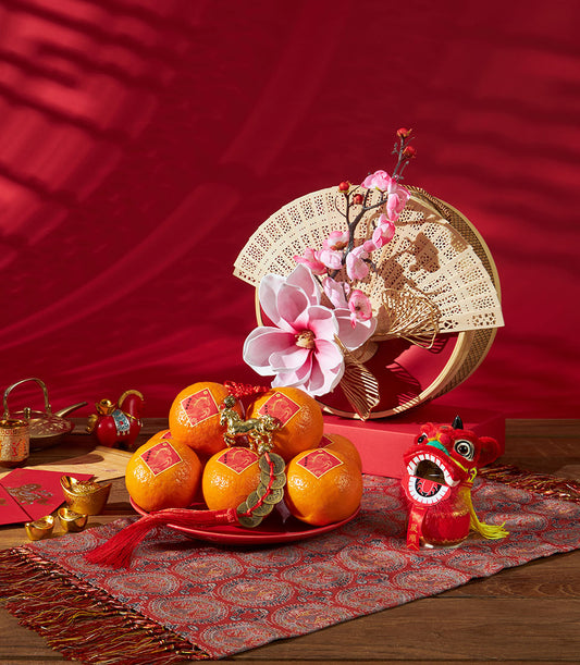 Premium mandarin orange gift set with gold horse charms and cherry blossoms for Chinese New Year