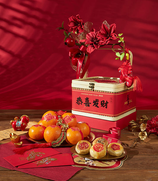 Premium mandarin oranges and traditional pastry gift box for Chinese New Year 2026, Year of the Horse, featuring red tin
