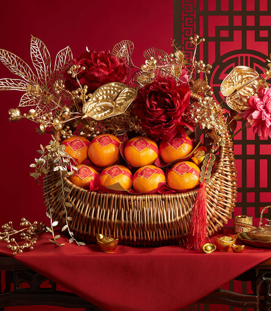 Premium Chinese New Year mandarin orange gift basket with red peonies, gold accents, and lucky coins