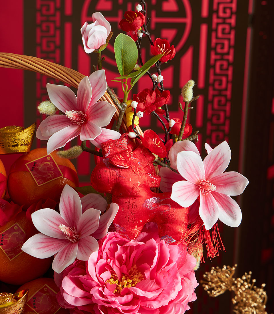 Prosperity Mandarin Orange gift basket with pink magnolias, red plum blossoms, and golden ingots for Chinese New Year