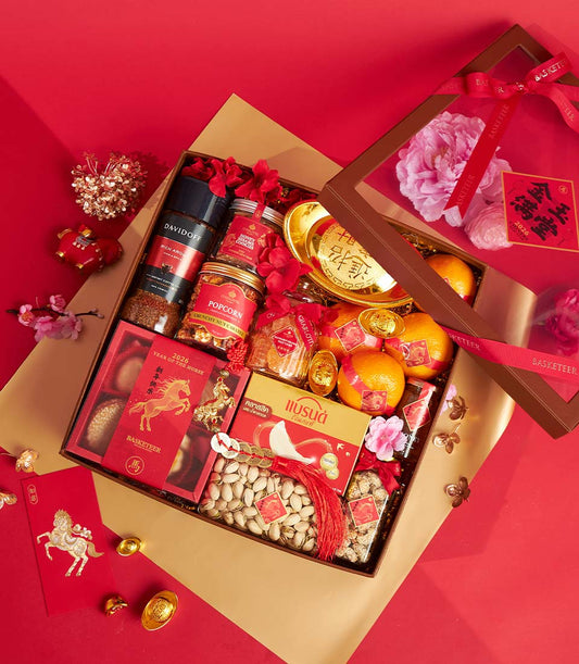 Premium Chinese New Year mandarin orange gift box with Davidoff coffee, gourmet treats, gold accents, and lucky red envelope