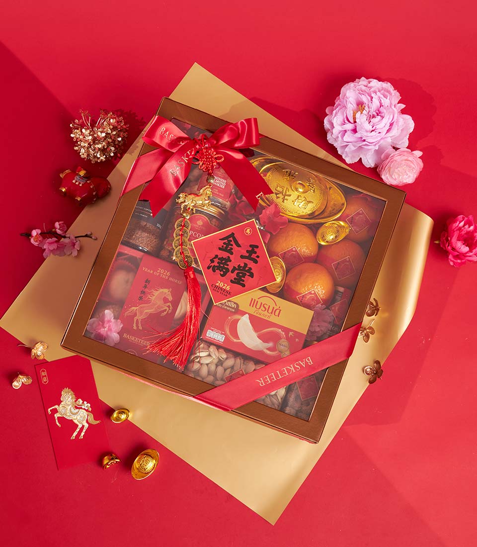 Premium mandarin orange and gourmet gift box with coffee, bird's nest, and gold accents for Chinese New Year prosperity