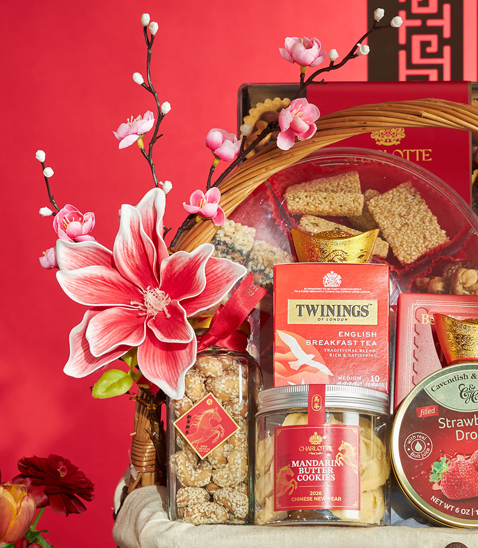Luxury festive gift basket with mandarin butter cookies, tea, and gold ingots for Chinese New Year
