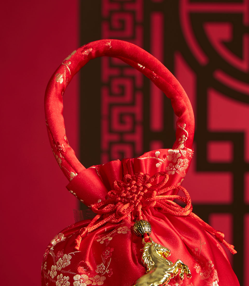 Red silk drawstring pouch with gold floral embroidery and charm, Chinese New Year mandarin orange gift bag