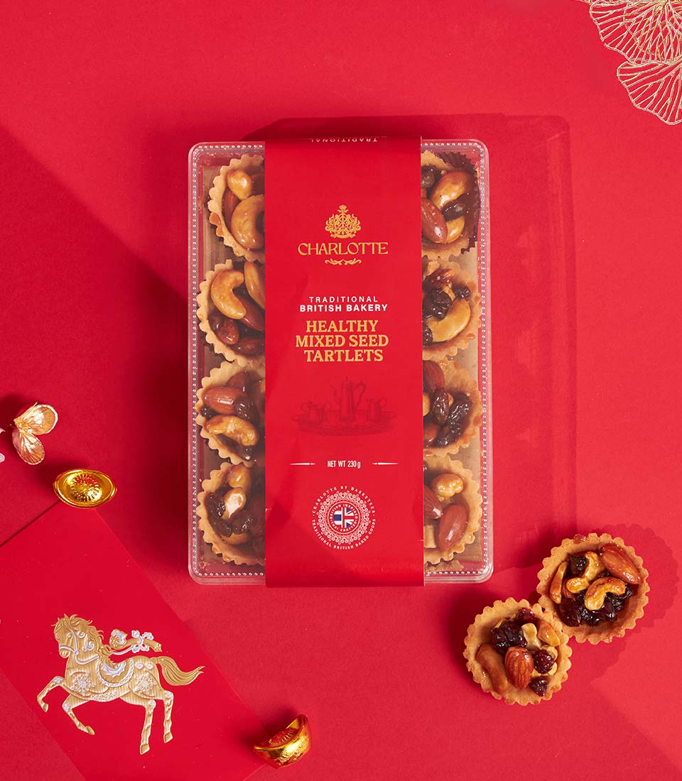 Charlotte Bakery healthy mixed seed tartlets in gift box with nuts and dried fruits, festive red packaging for New Year