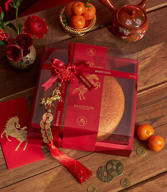 Mandarin Orange Blessing Sponge Cake in red gift box with golden horse ribbon, Lunar New Year celebration set with red