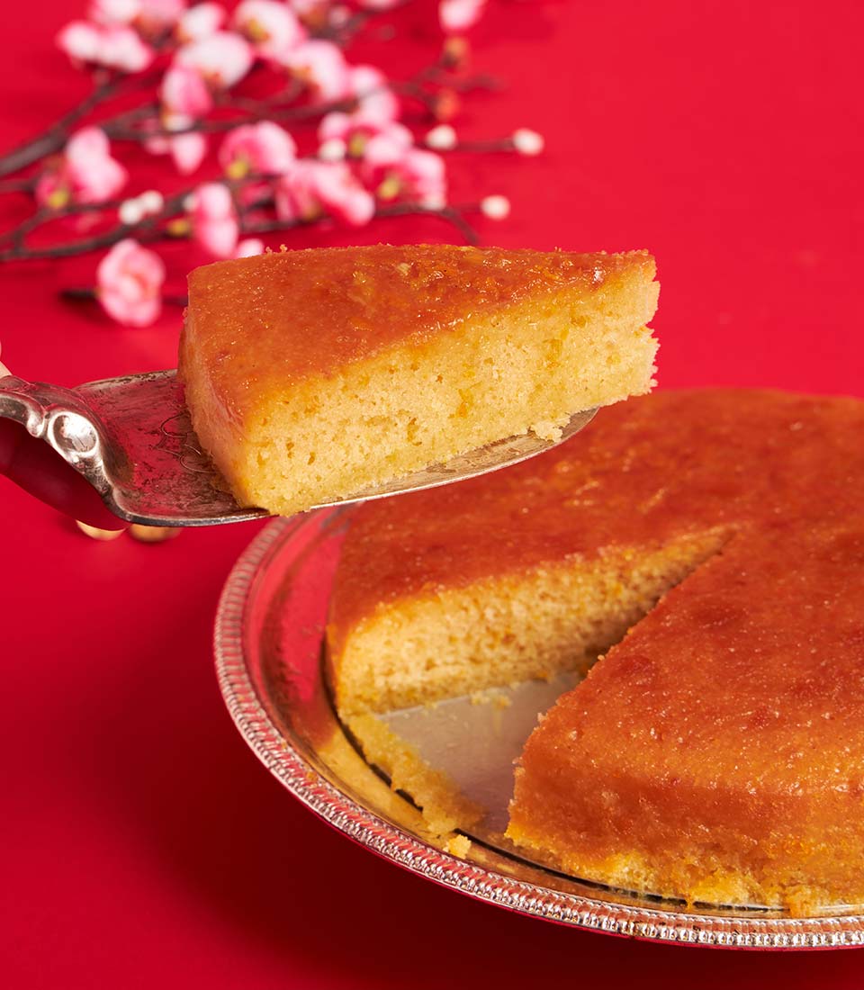 Golden mandarin orange blessing sponge cake with glossy citrus glaze, Chinese New Year gift hamper