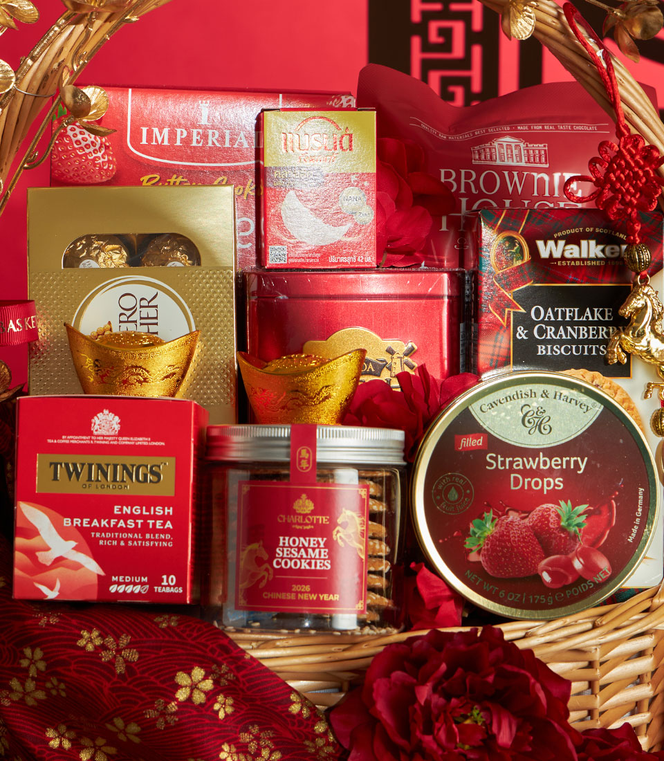 Luxury Chinese New Year gift basket with Ferrero Rocher chocolates, premium teas, and gourmet treats in red and gold