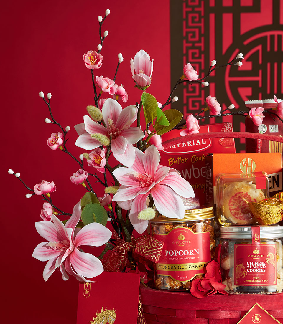 Red Chinese New Year gourmet gift basket with almond cookies, caramel popcorn, butter cookies, mooncakes, gold ingot charm,