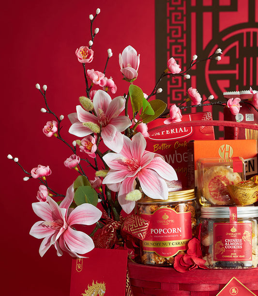 Red Chinese New Year gourmet gift basket with almond cookies, caramel popcorn, butter cookies, mooncakes, gold ingot charm,