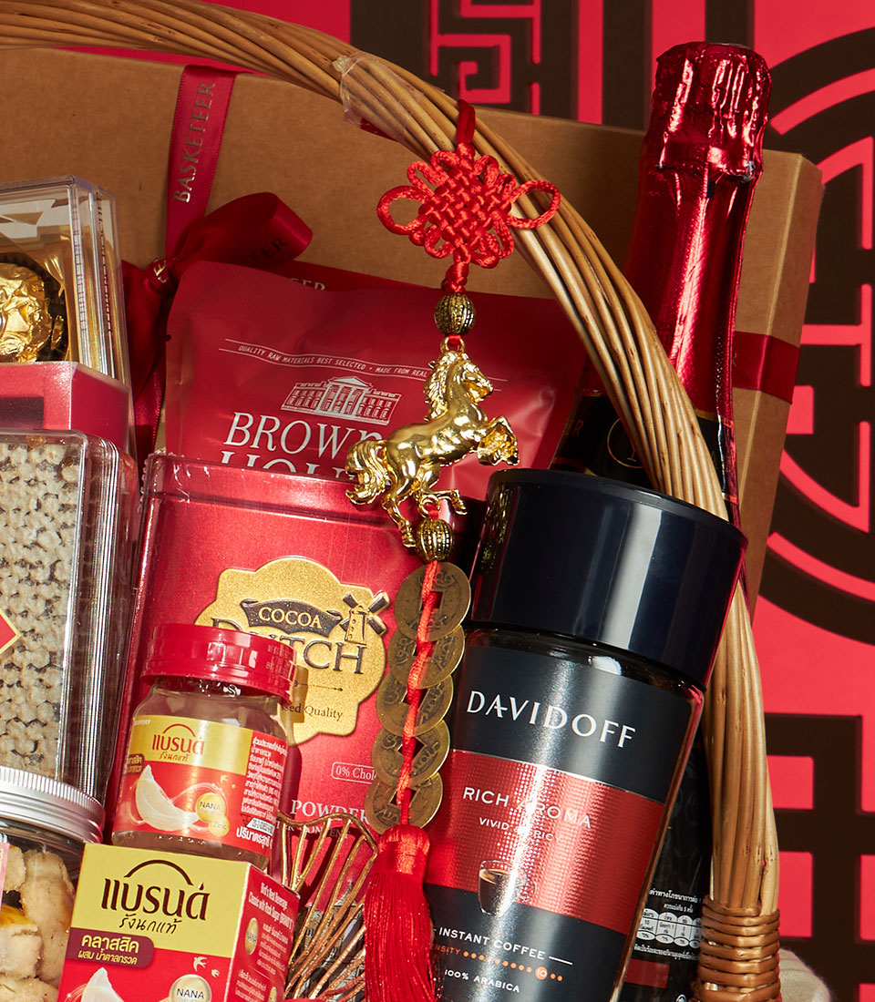Premium Chinese New Year gift basket with sparkling wine, Davidoff coffee, gourmet chocolates, and golden lucky charms on