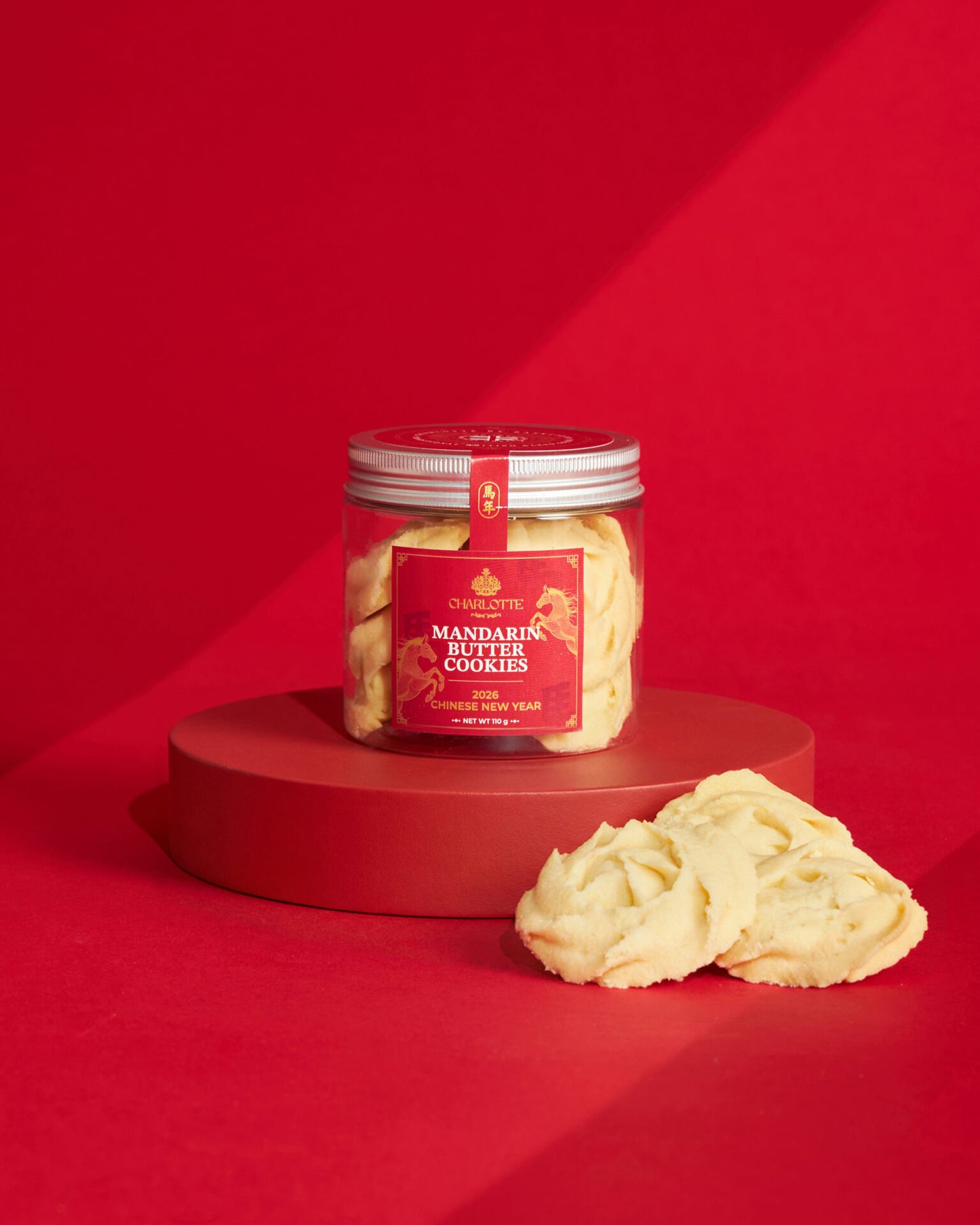 Mandarin butter cookies in red-labeled glass jar for Chinese New Year gifting