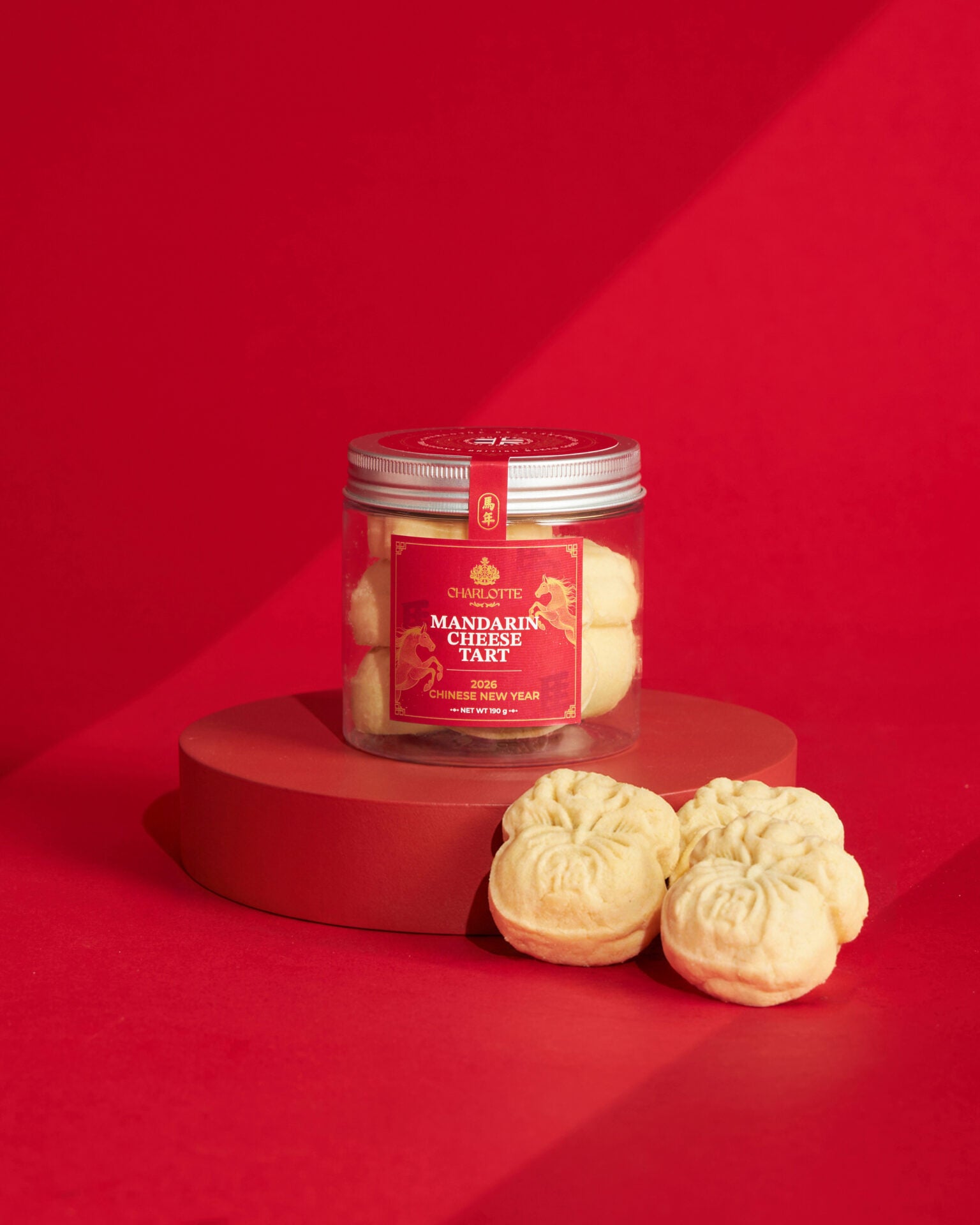 Mandarin cheese tart cookies in sealed jar with red and gold Chinese New Year 2026 label
