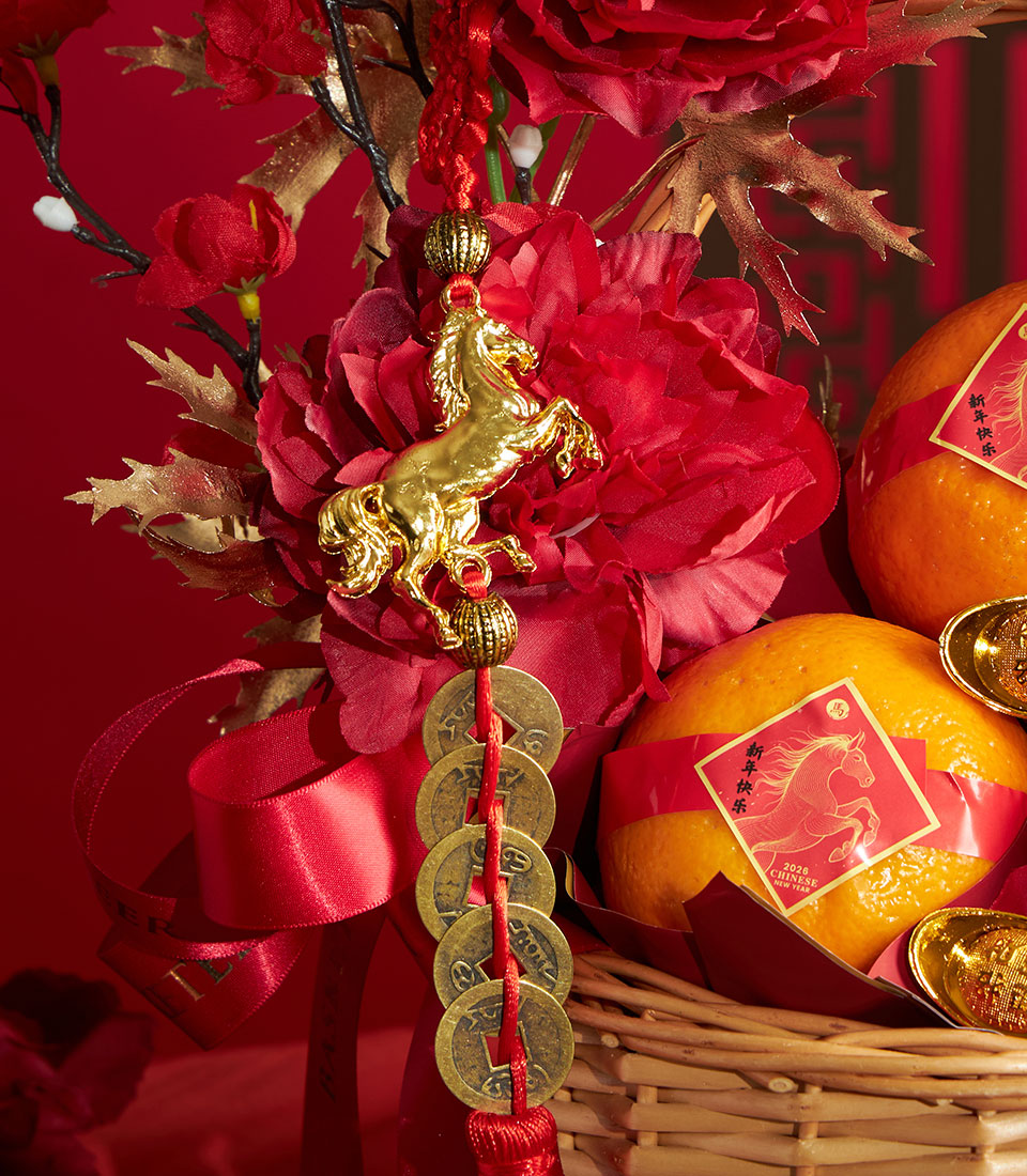 Luxury red and gold Mandarin orange gift basket with golden horse charm, silk flowers, and Chinese New Year 2026 tags