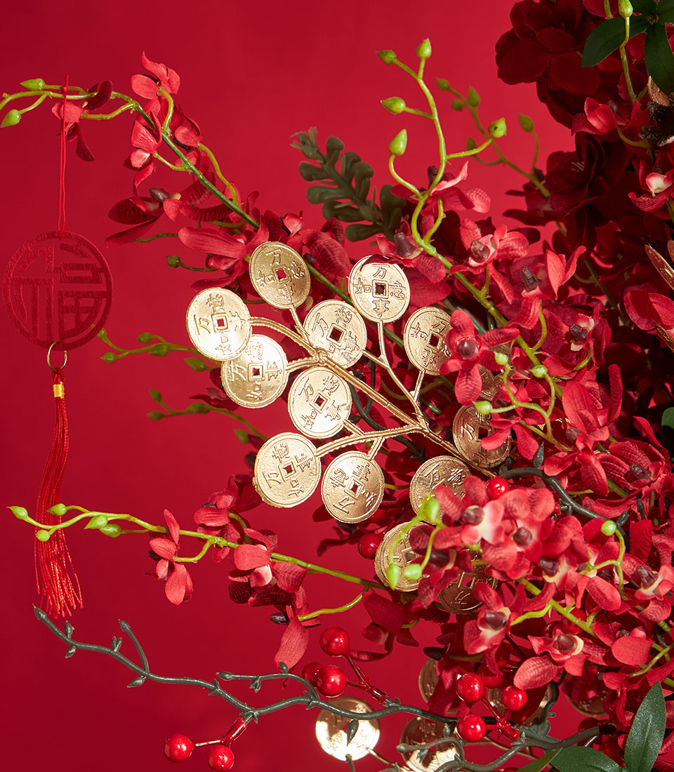 Basketeer luxury gift: Red peony floral arrangement with gold coins and tassels for Chinese New Year, a premium hamper delivery in Bangkok.