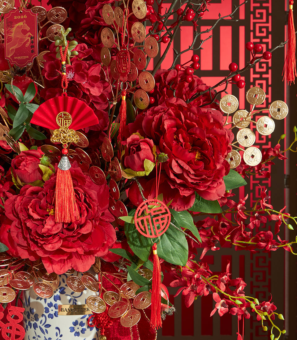 Basketeer premium hamper for Chinese New Year, Bangkok delivery. Red peony arrangement with gold coin accents, a luxurious corporate gift.