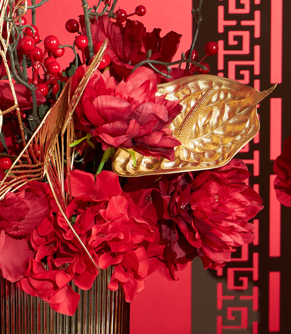 Basketeer: Luxurious Chinese New Year gift with vibrant red blooms, golden anthurium and berry accents. Premium Bangkok hamper delivery.