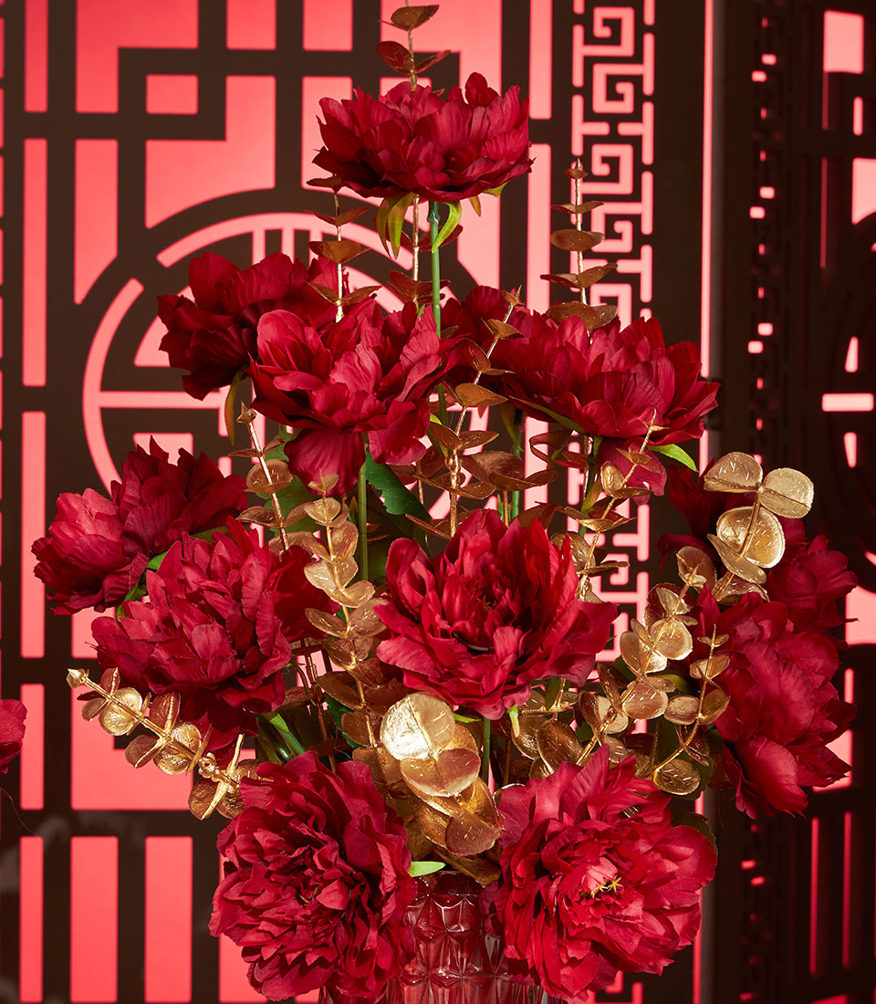 Basketeer premium hamper delivery Thailand: a luxurious gift of deep red artificial flowers and golden accents for Chinese New Year. Perfect corporate gift Bangkok.