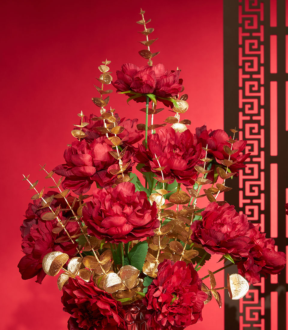 Basketeer Chinese New Year gift: striking red & gold artificial flower arrangement. A premium corporate gift to celebrate in Bangkok, Thailand.