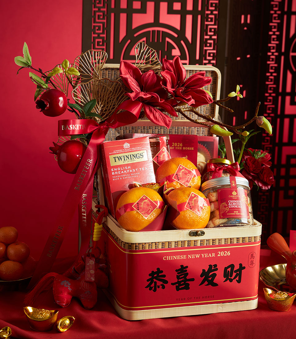 Red and gold Chinese New Year hamper with mandarin oranges, gourmet tea, and almond cookies, Year of the Horse 2026