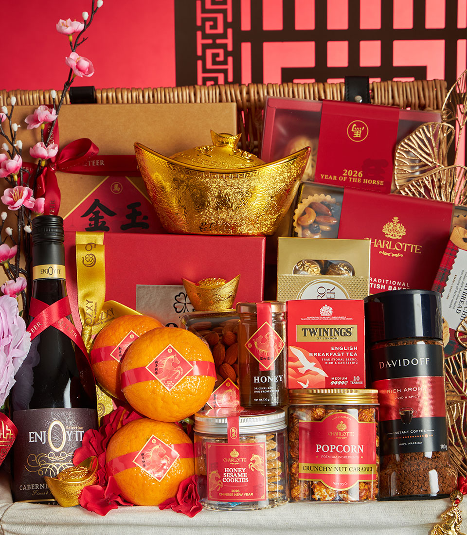 Premium Chinese New Year gift basket with golden ingot box, red gift boxes, non-alcoholic wine, and gourmet treats