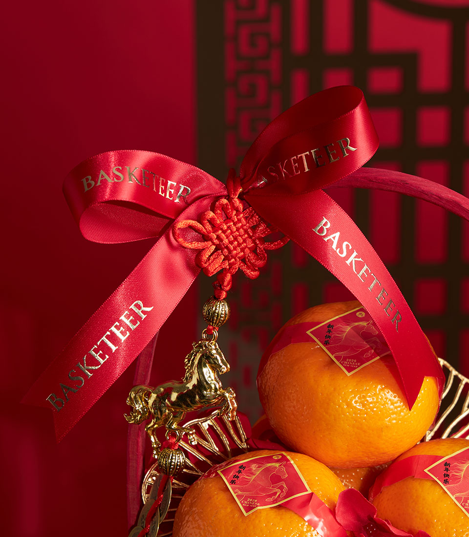 Red and gold Chinese New Year mandarin orange gift basket with gold horse charms and satin Basketeer ribbon