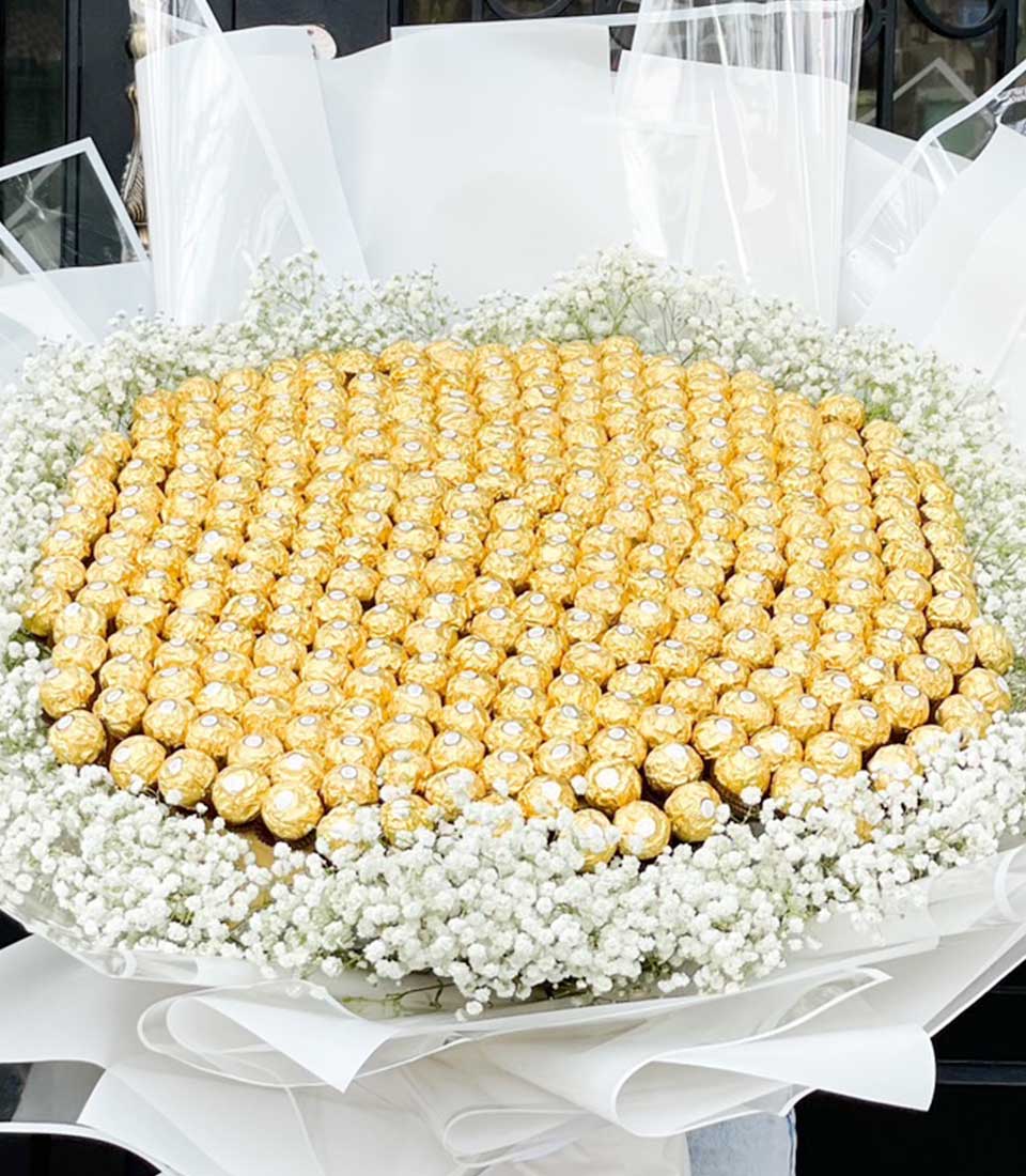 Grand Ferrero Rocher Bloom Bouquet with white baby's breath and gold chocolates for Valentine's Day