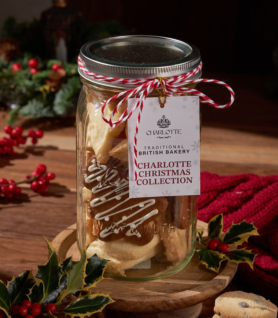 Artisan Christmas biscuits in a jar from Charlotte Bakery, decorated with festive twine. A taste of a British bakery in Thailand.