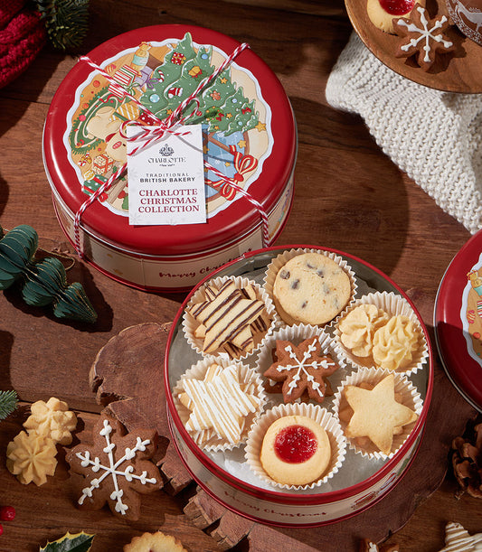Grandma Amy's Christmas Biscuit Collection sharing tin with assorted festive cookies in red holiday packaging
