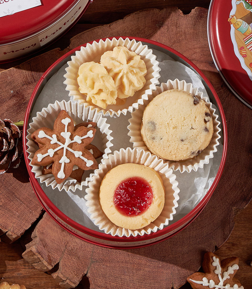 Grandma Amy's biscuit collection from Charlotte Bakery. Selection of British-style artisan pastries in a festive red tin. Order custom cake Bangkok!