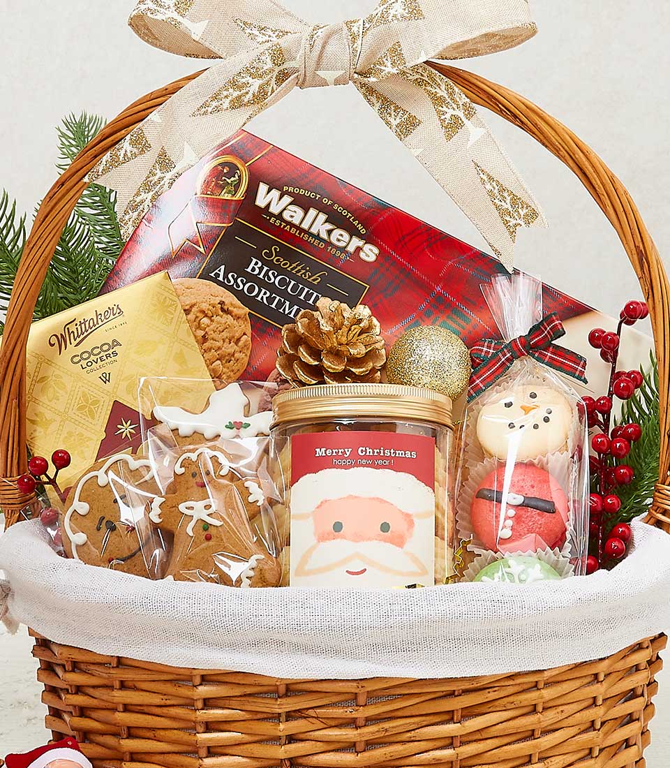 Festive wicker Christmas gift basket with Scottish biscuits, Whittaker's chocolate, gingerbread cookies, and holiday