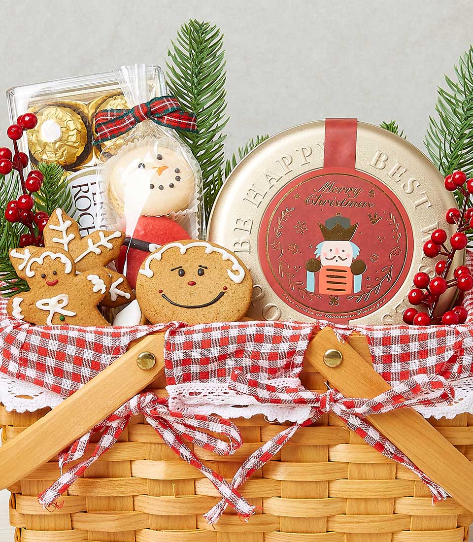 Woven Christmas snack basket with gingerbread cookies, chocolates, and festive red checkered ribbon