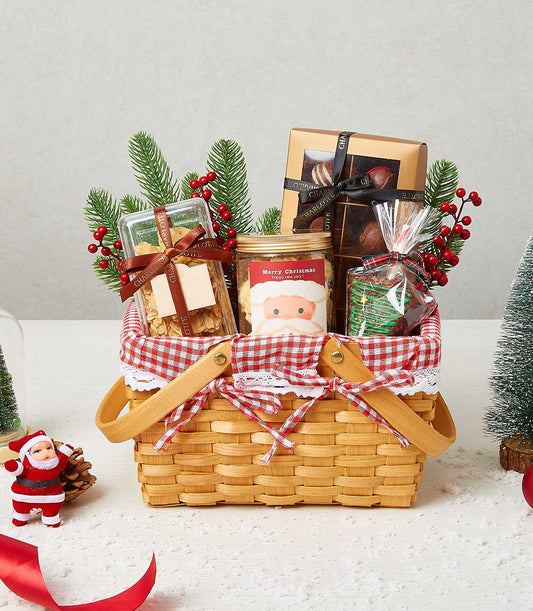 Festive woven Christmas hamper with gourmet treats, red gingham liner, and holiday decorations