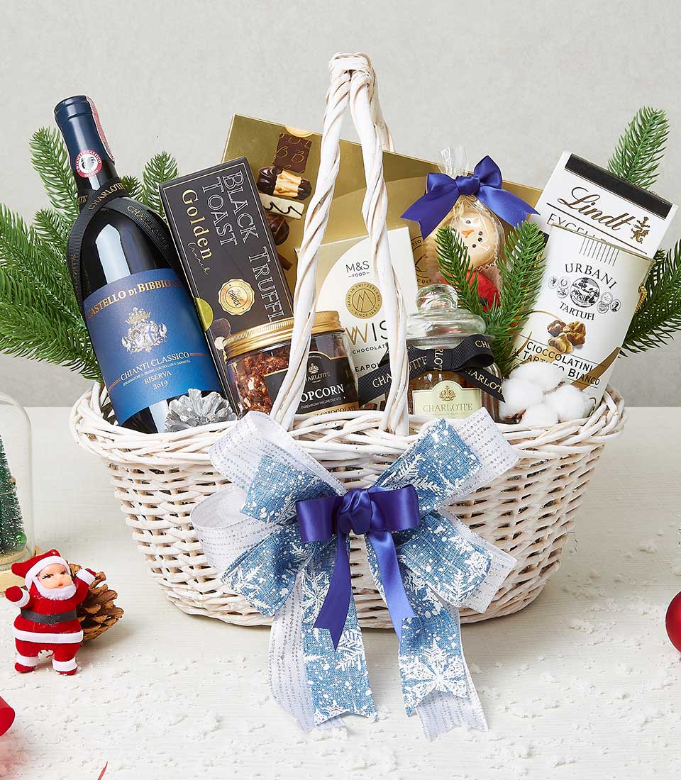 Premium festive wine gift basket with Chianti, truffles, chocolates, and gourmet treats for Christmas