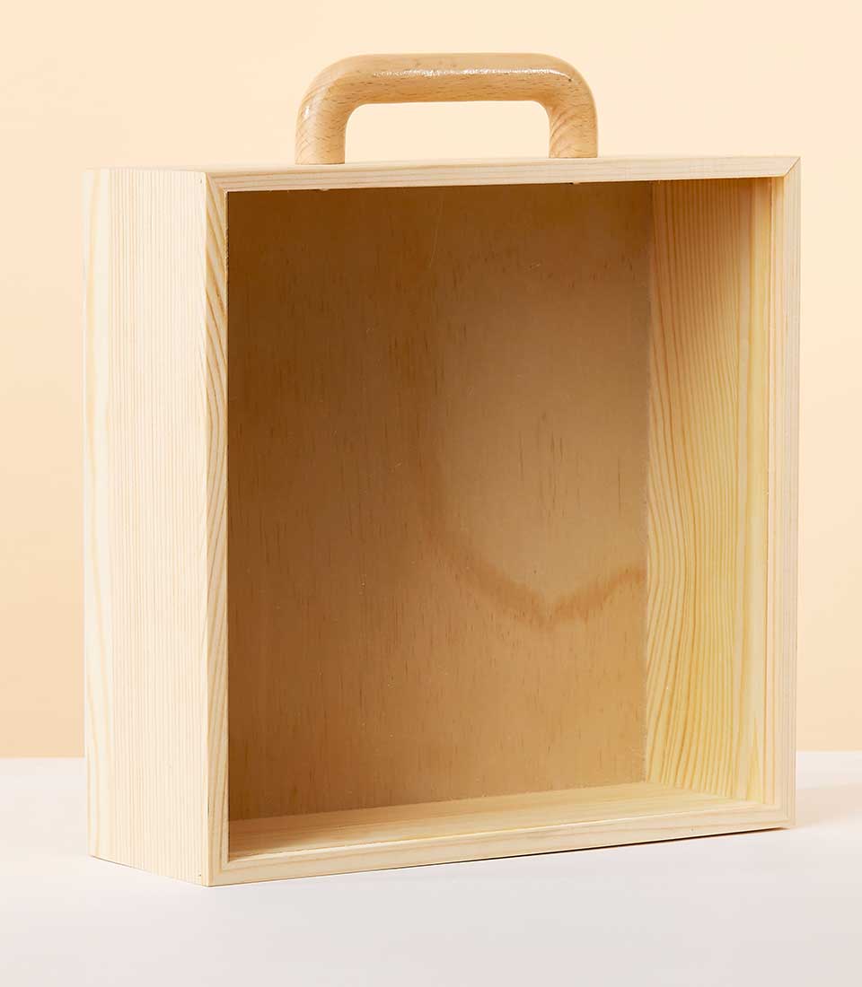 Light wooden storage box with acrylic lid and curved handle, natural pine finish