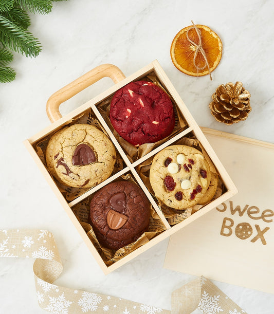 Assorted gourmet cookies gift box with red velvet, chocolate chip, double chocolate, and white chocolate cranberry cookies