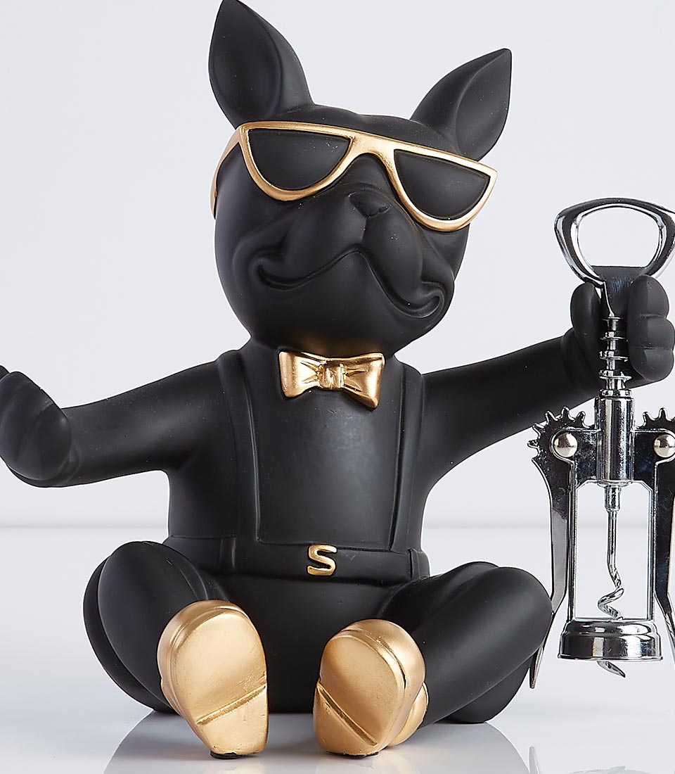 Black French Bulldog wine bottle holder with gold accessories and corkscrew tool