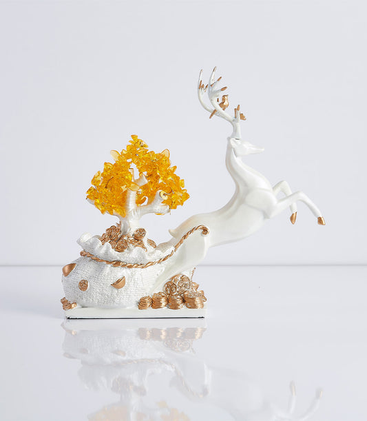 Feng Shui lucky deer leaping over white money bag with golden crystal money tree figurine