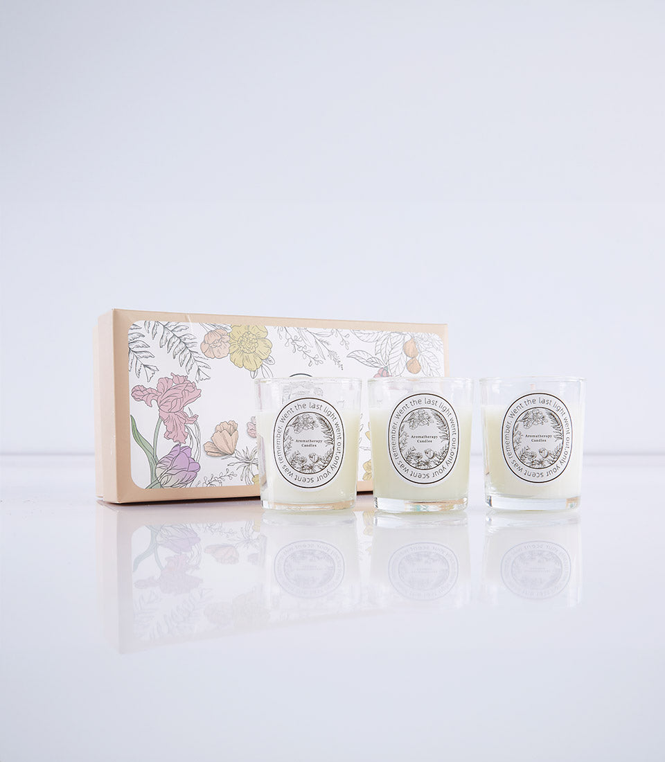 Luxury floral scented candle gift set with three glass votives and decorative iris-printed box