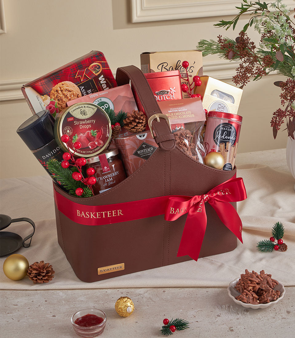 Luxury brown leather gift tote with gourmet cocoa, coffee, chocolates and festive trimmings for New Year gifting