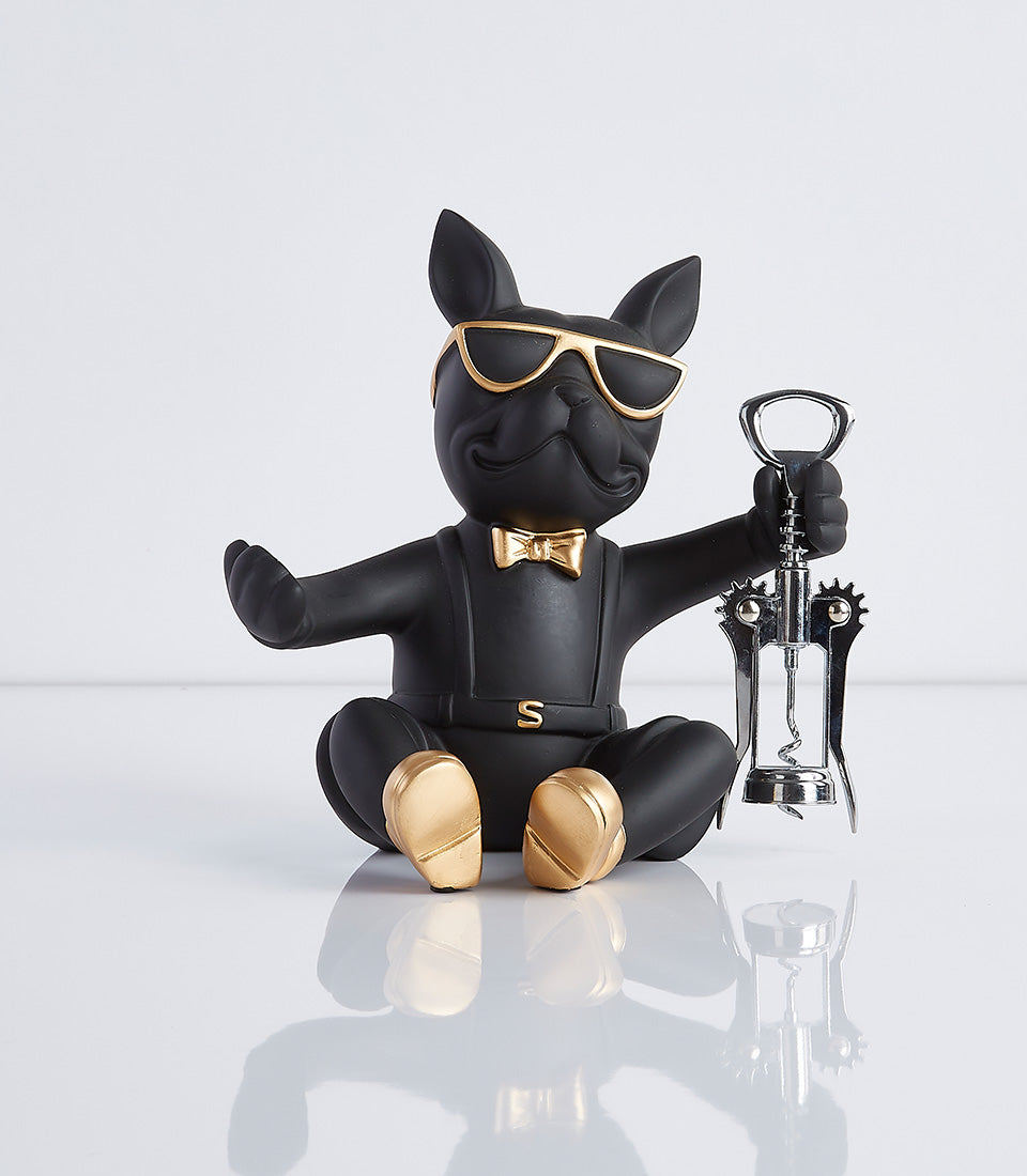 Black French Bulldog wine bottle holder with gold accessories and winged corkscrew