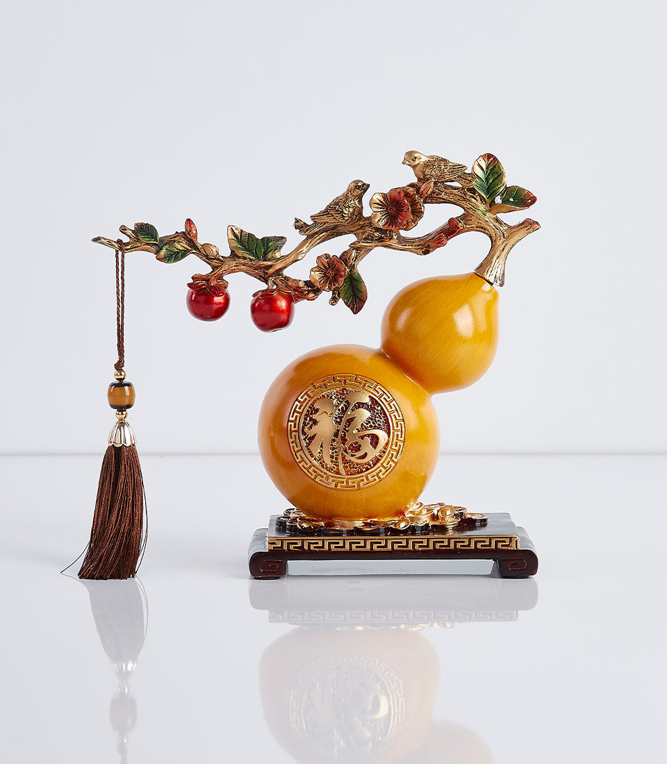 Golden gourd ornament with Fu character, birds, and bronze branch for prosperity gifting