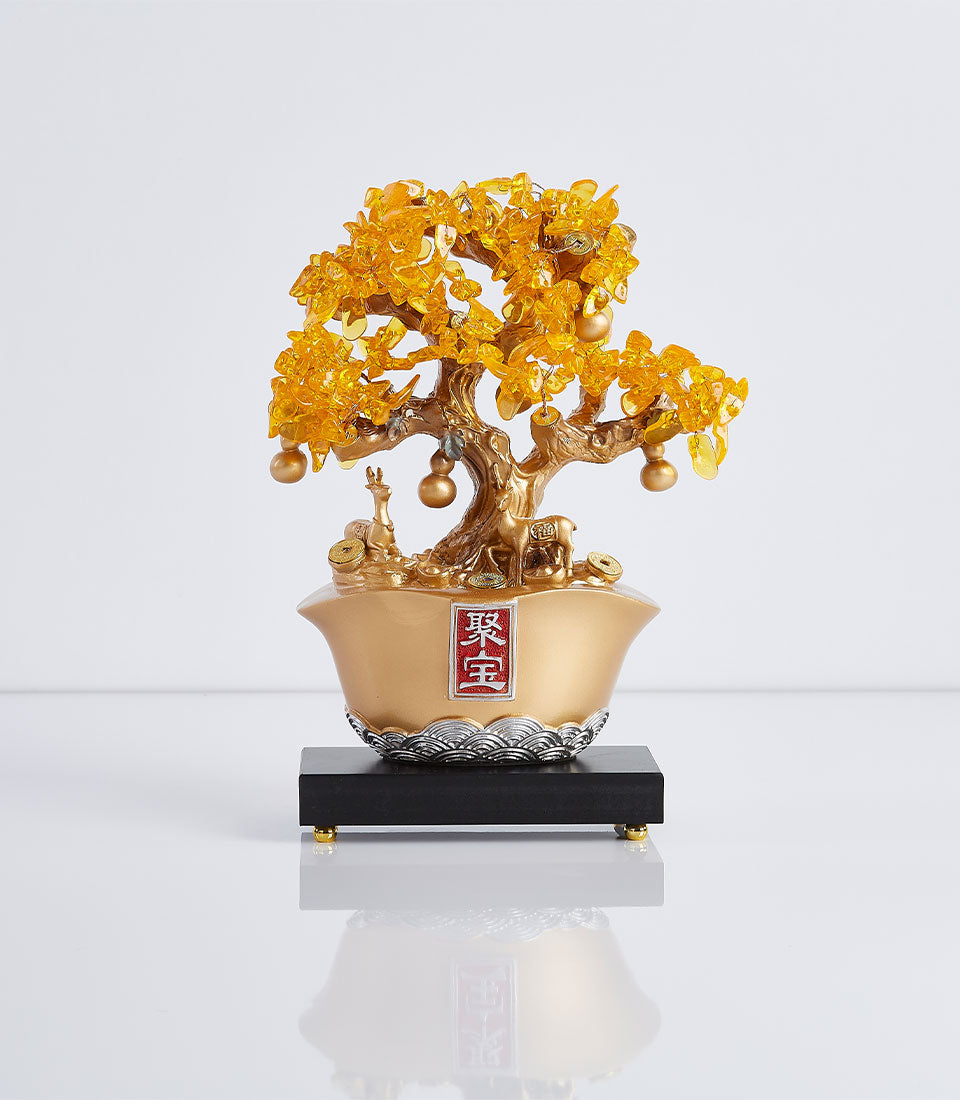 Golden lucky money tree with citrine crystals in ornate pot, prosperity symbol for new homes and gifting