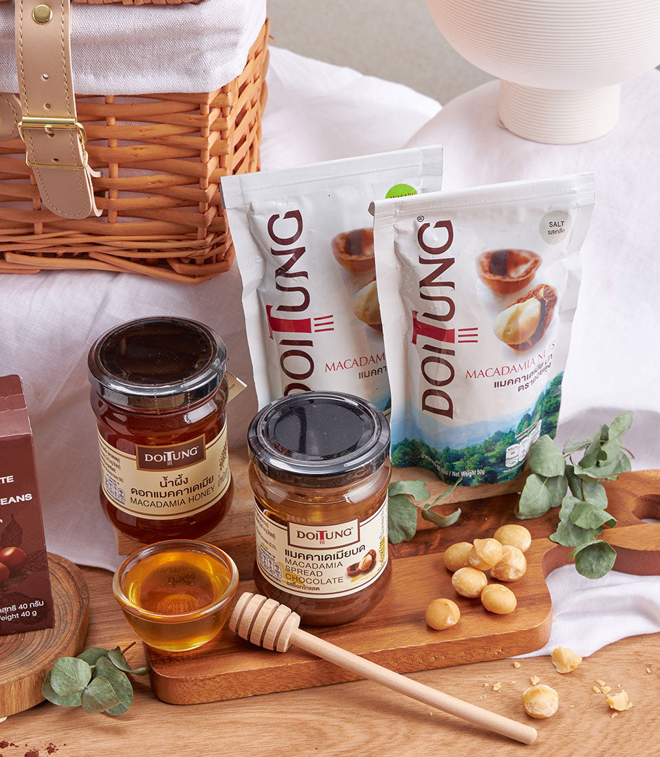Premium DoiTung macadamia and coffee gourmet gift set with nuts, honey, and chocolate spread in artisan hamper
