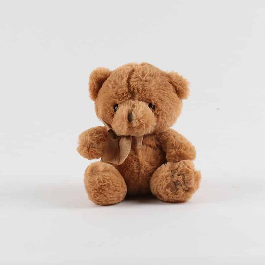 Soft brown plush teddy bear with ribbon bow, perfect for gift hampers