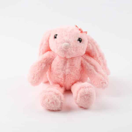 Soft pink plush bunny with floppy ears and bow for gifting