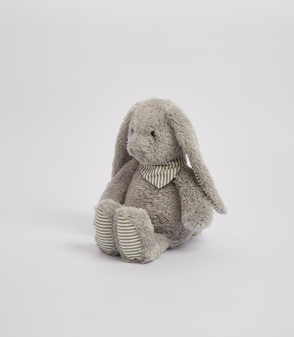 Cuddly gray plush bunny with striped bandana from Basketeer, perfect for a premium baby gift hamper delivered in Bangkok.